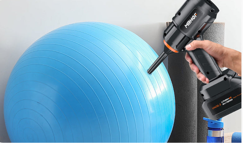 Hand using a MBNGF product to inflate a blue exercise ball with text 'Inflating Sports Equipments' on a light gray background.